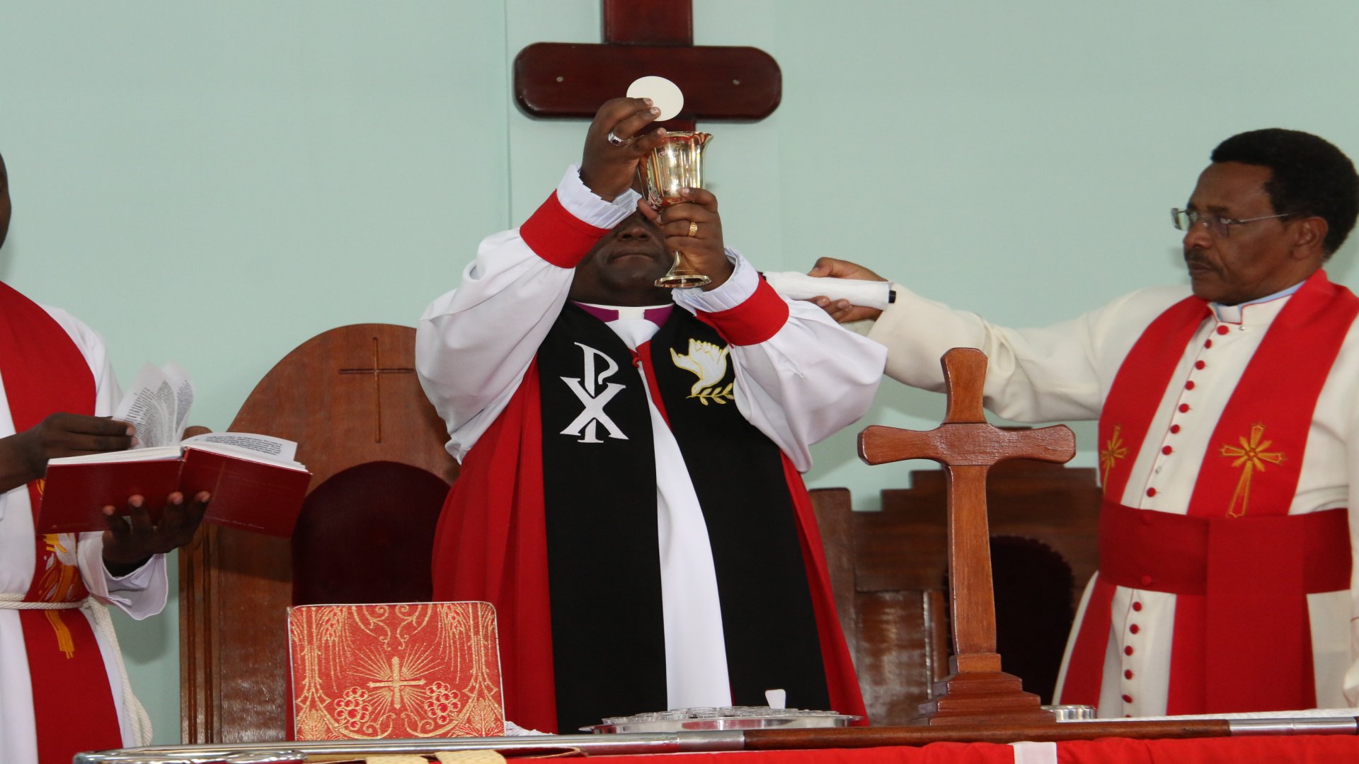 Holy communion by Bishop Rt. Rev Jonathan Kabiru